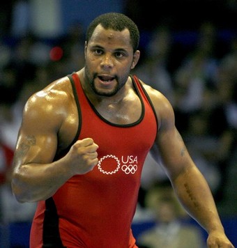 Cormier of the U.S. celebrates winning a bronze medal during the men's Free Style 96kg finals at the Senior Wrestling World Championship in Baku
